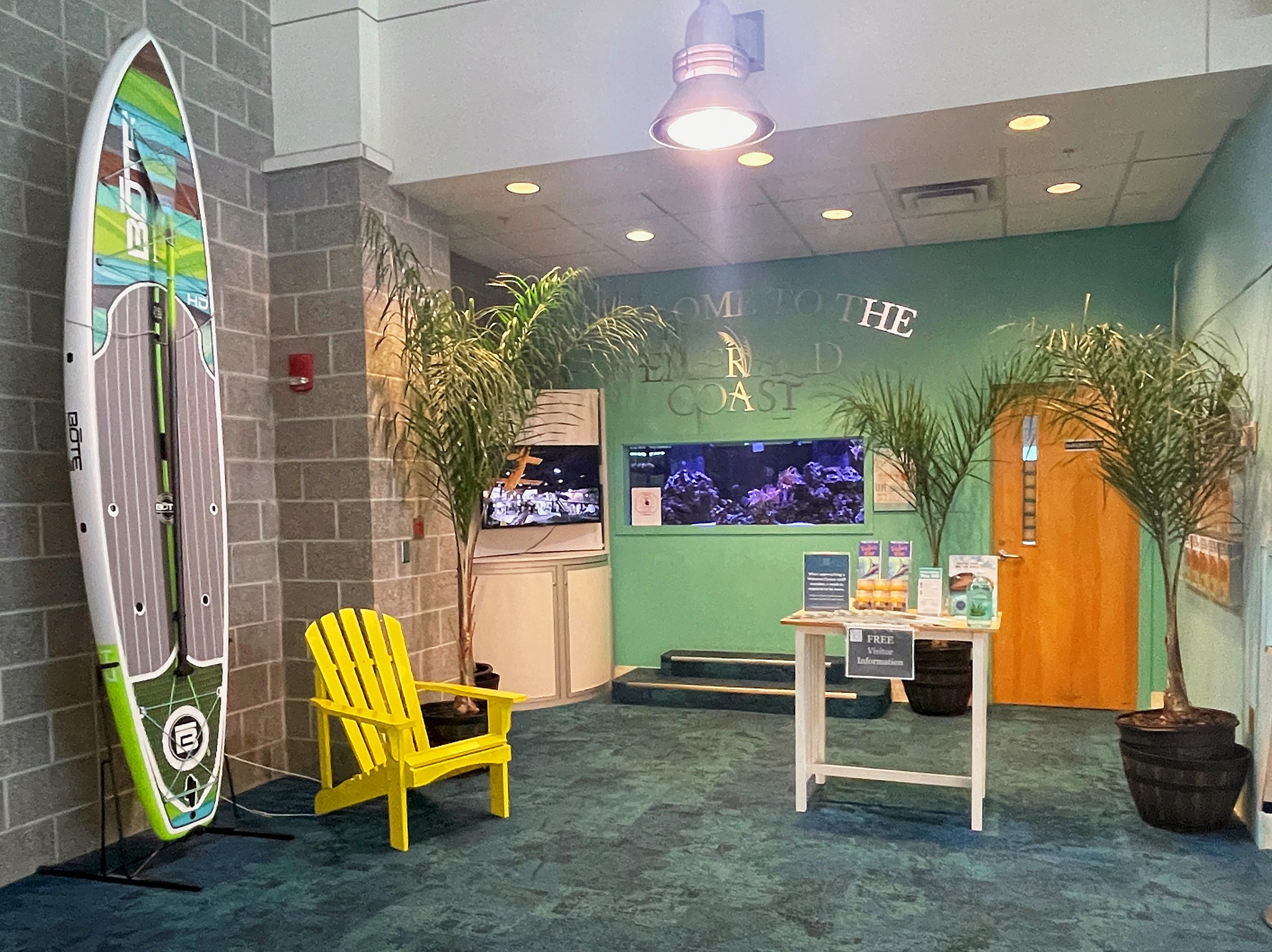 photo of Visitor Information display at Destin-Fort Walton Beach Airport (Convention and Visitors Bureau - Welcome to the Emerald Coast)